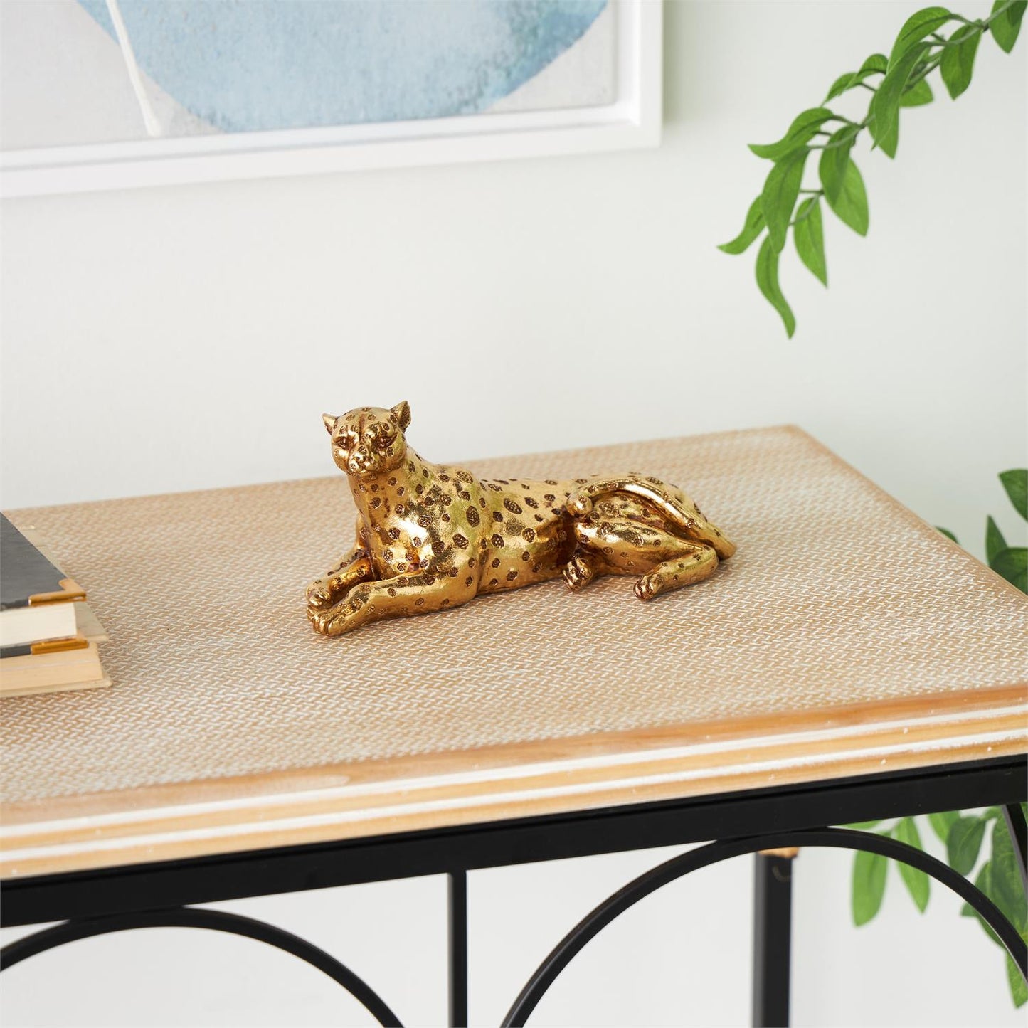 ESCULTURA DECORATIVA LEOPARDO ACOSTADO